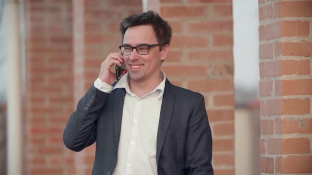 Caucasian Man Wearing Glasses Office Outfit Speaks Phone Footage Businessman — Video