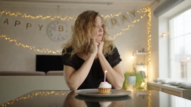 Woman Looking Room Picking Birthday Cake Blowing Its Candles She — Stock Video
