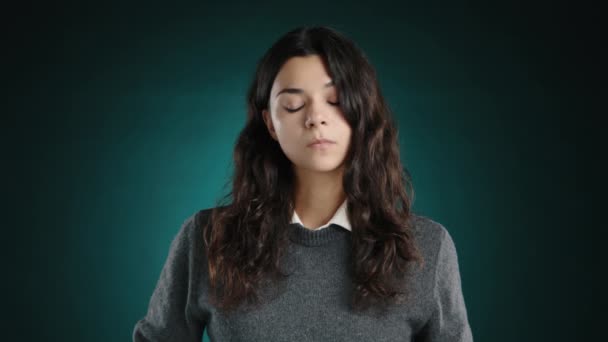 Girl Serious Gaze Looks Camera She Wearing Gray Sweater Brunette — Stock Video