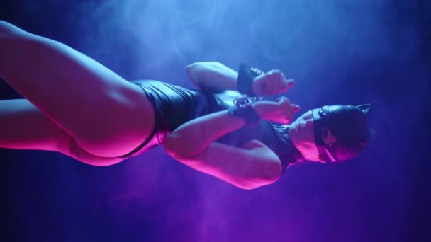 Catwoman Handcuffs Performs Bdsm Style Dance She Illuminated Pink Light — Stock Video