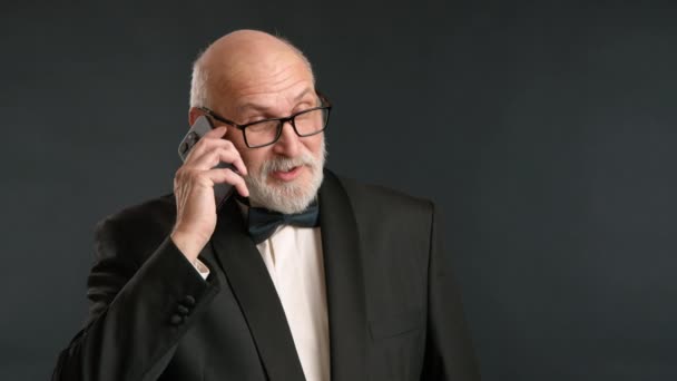 Dignified Man Black Tuxedo Bow Tie Talking Phone Has Gray — Stock Video