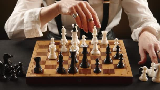 Close Chess Game Womans Hand Makes Move White Knight Captures — Stock Video