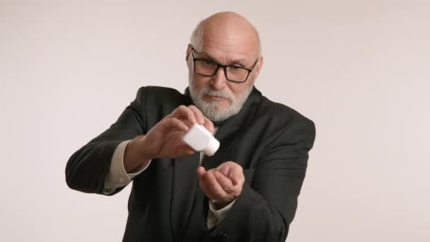 Senior Tuxedo Pours Many Pills Jar His Hand Demonstrates Old — Stock Video