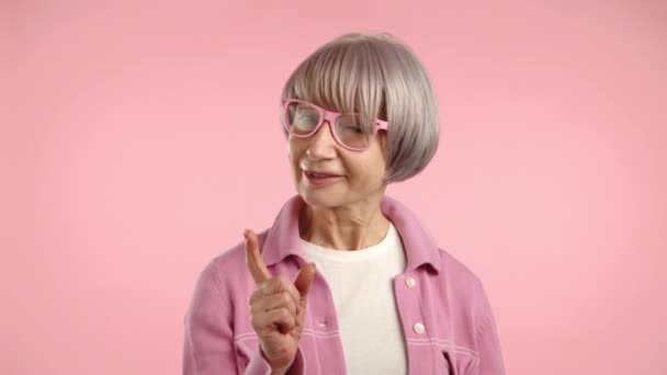 Stylish Senior Woman Silver Hair Smiling Adjusting Her Pink Glasses — Stock Video