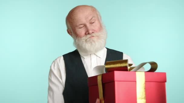 Elderly Man Holds Large Red Gift Box Big Bow Presenting — Stock Video