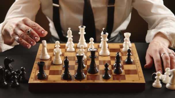 Close Chessboard Tense Game Confident Hand Making Decisive Move White — Stock Video