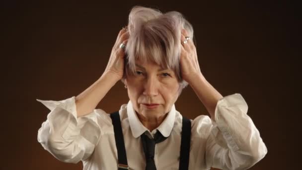 Woman Years Old Adjusts Her Hairstyle Gracefully Poses Camera Room — Stock Video