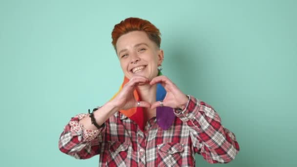 Lesbian Woman Bright Smile Rainbow Scarf Makes Heartfelt Hand Gesture — Stock Video