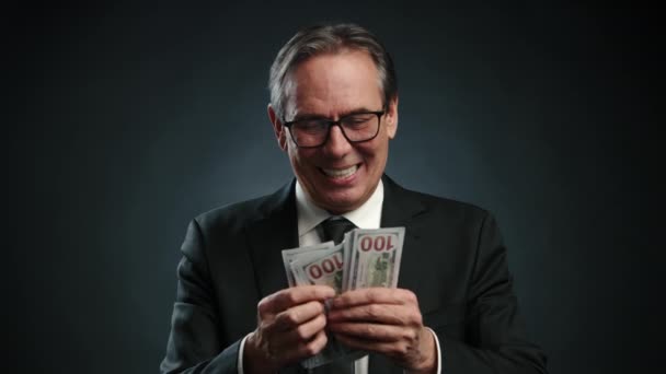 Man Business Suit Tie Joyfully Counts Dollars His Hands Displays — Stock Video