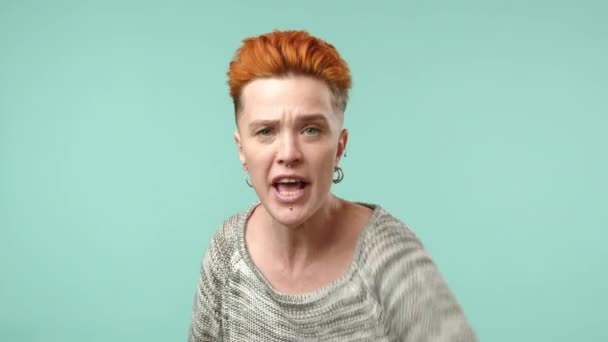 Fierce Lesbian Woman Orange Hair Passionately Uses Bold Hand Gestures — Stock Video