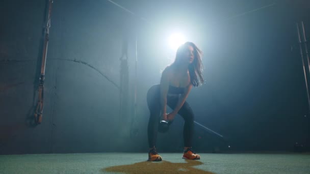 Gym Bathed Dramatic Backlighting Dedicated Female Athlete Performs Series Kettlebell — Stock Video