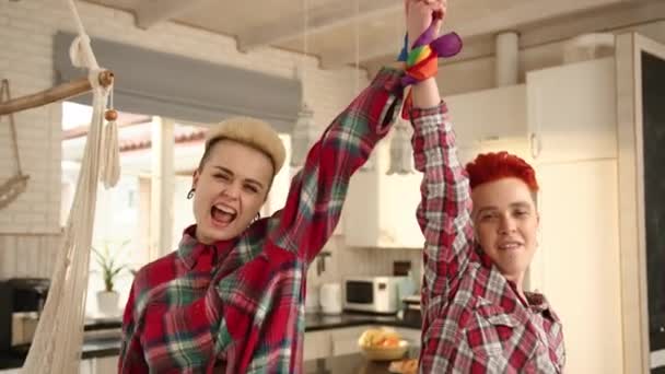 Lesbian Couple Celebrates Identity Lowering Lgbt Flag Raising Hands Tied — Stock Video
