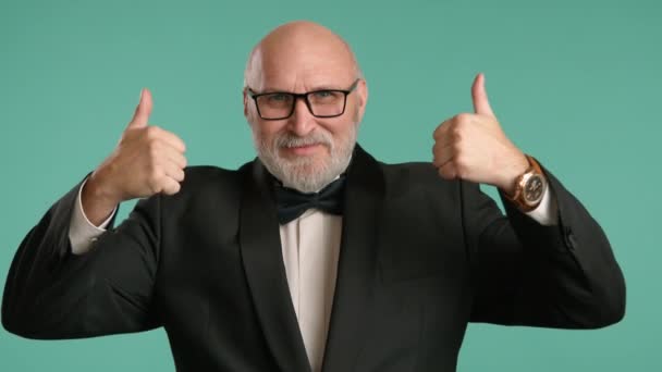 Distinguished Elderly Man Classic Black Jacket Bowtie Initially Gives Thumbs — Stock Video