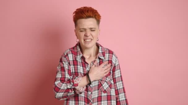 Distressed Lesbian Woman Clutches Her Chest Sincere Display Heartache Discomfort — Stock Video
