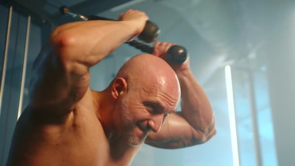 Intense Gym Session Bodybuilder Focusing Arm Strength Utilizing Cable Crossover — Stock Video