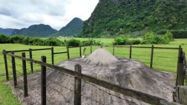 Quang Binh countryside landscape with cultural customs of ethnic minority, circular tomb as hat shape from concrete to burial deceased, mountain view at Tu Lan village, Viet Nam