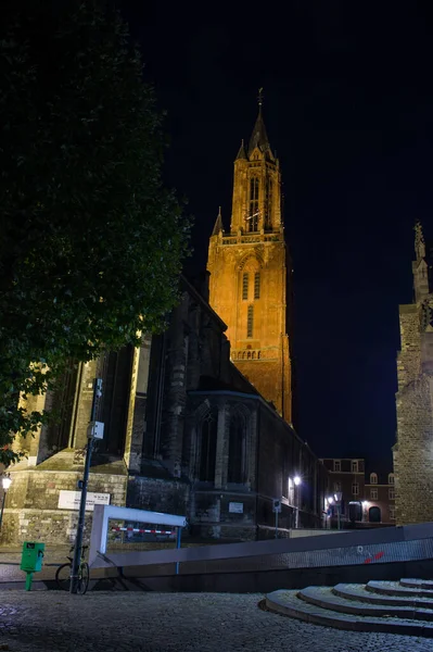 stock image Red tower of the church of Saint John at night in Maastricht in the Netherlands