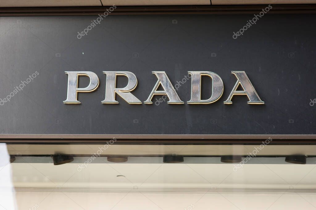 Copenhagen, Denmark - April 9, 2023: Logo of Prada on a  facade of a building in shopping street. Prada is an Italian luxury fashion house