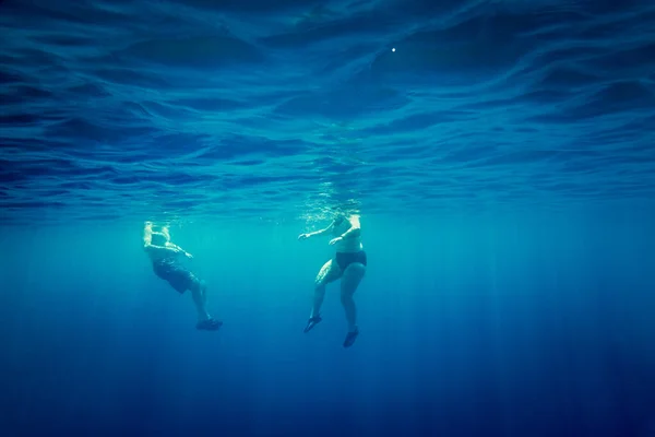 Low Section Man Woman Sea Male Female Swimming Together Blue — Stock Photo, Image