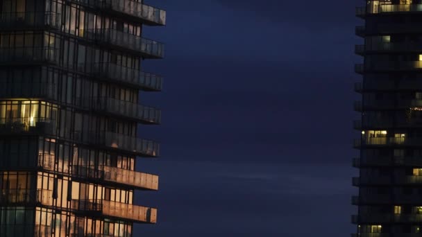 Illuminated Modern High Rise Buildings Blue Cloudy Sky Night — Stock Video