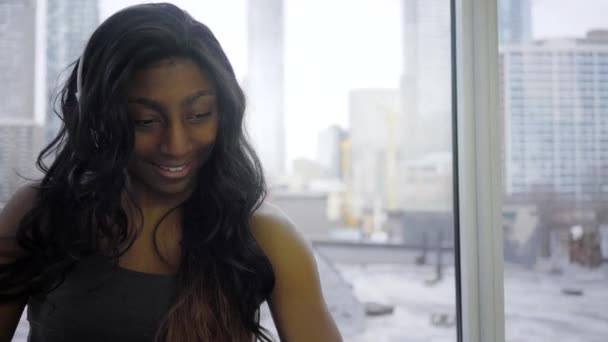 Smiling Black Woman Chatting Smartphone Modern Apartment Window — Stock Video