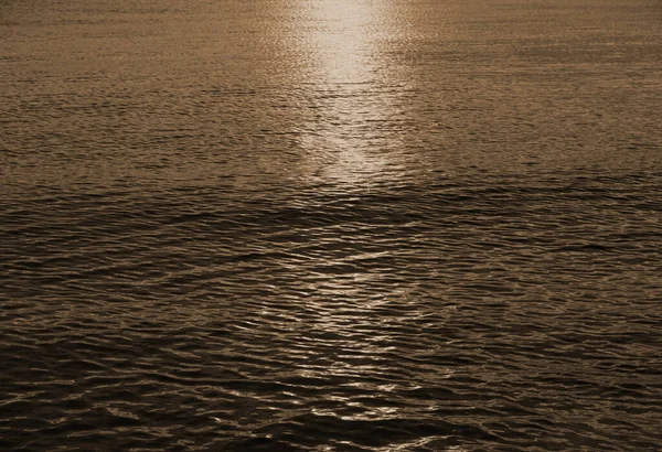 Kupfer Farbton Wellenförmigen Hintergrund Der Meeresoberfläche Bei Sonnenuntergang Während Der — Stockfoto