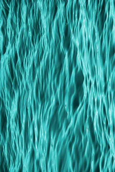 Abstract background in turquoise patterned illustration, close up sea surface photo