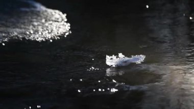 Texture piece of ice floe in a mountain river