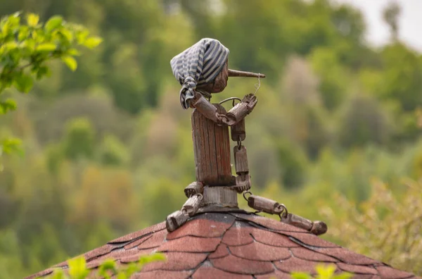 stock image Wooden pinocchio doll instead of a weather vane