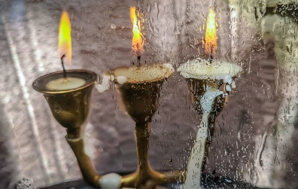 Three Candles Candlestick Glass Rain — Stock Photo, Image