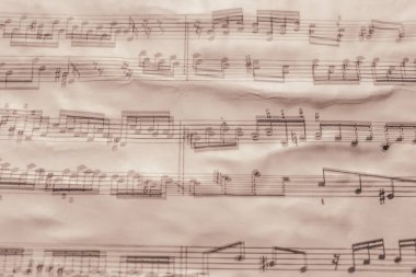 Arka planda çift pozlama olan bir Bach parçasının müzik gösterimi