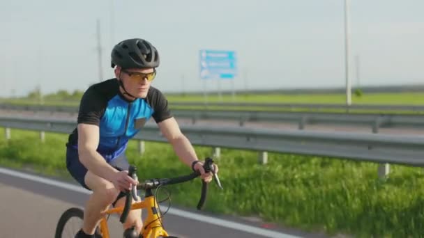 Front View Professional Cyclist Sports Equipment Shoes Helmet Sunglasses Riding — стоковое видео