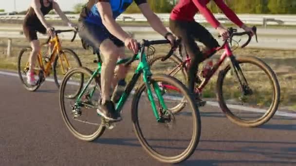 Two Men One Women Muscular Legs Practising Cycling Asphalt Road — Stock Video