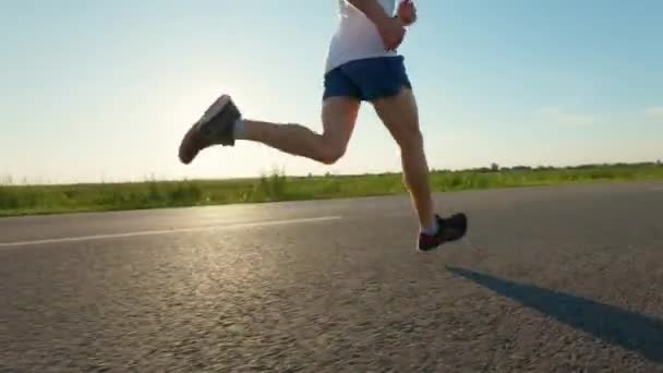 Close Man Wearing Shorts Shirt Sneakers Running Fast Road Sportsman — Stock Video