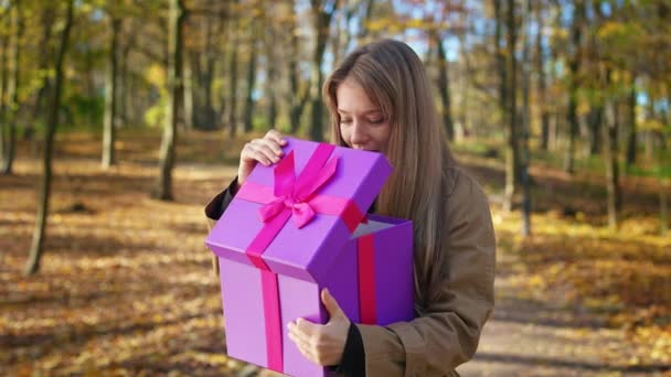 Front View Surprised Young Woman Standing Park Opening Present Positive — Stock video