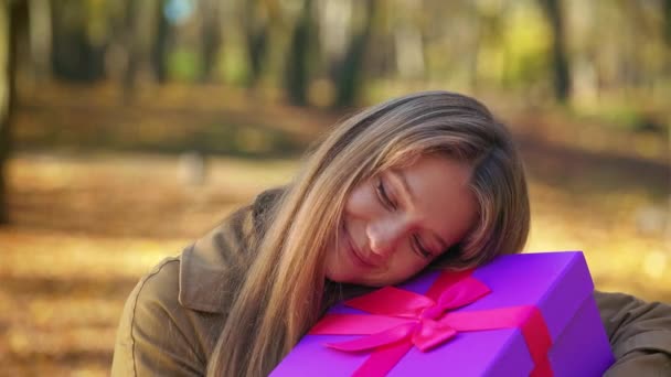 Front View Happy Young Woman Standing Park Holding Present Attractive — Stock video