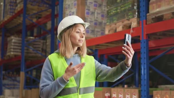 Female Product Manager White Hardhat Reflective Vest Standing Industrial Storehouse — Stock Video