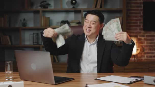 Lucky Asian Man Winning Jackpot Lottery Holding Lots Dollar Bills — Stock Video