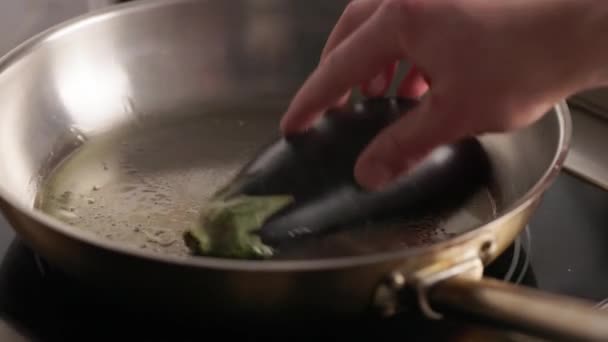 Influential Head Cook Placing Slice Eggplant Stainless Steel Frying Pan — Stock Video