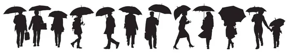 傘の下で人々 男と女の黒いシルエット — ストックベクタ