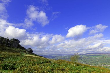 The Cow and Calf rocks are a large rock formation consisting of an outcrop and boulder, also known as Hangingstone Rocks. clipart