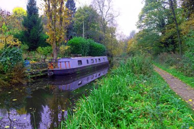 The Caldon canal opened in 1779 to carry Peak District limestone from the quarriesat Cauldon Low down to the Potteries and the Industrial Midlands. clipart