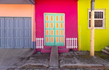 Colorful colonial architecture of historic center of Flores, Guatemala. clipart