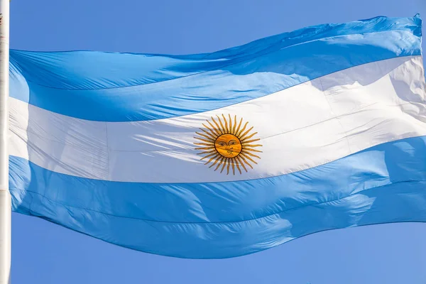 stock image Argentinian Flag near Casa Rosada president office on historic Plaza de Mayo in Buenos Aires.