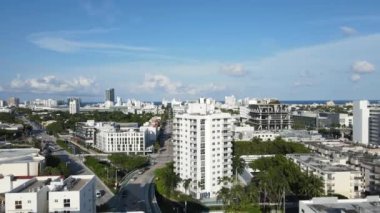 South Beach Miami, Florida, USA. Drone Aerial View of Residential Buildings and Street Traffic on Sunny Day, Sliding Drone Shot 4k