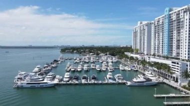 Miami, Florida USA. Drone Aerial View of Yachting Club Marina and Bayfront of Biscayne Bay on Sunny Day 4k