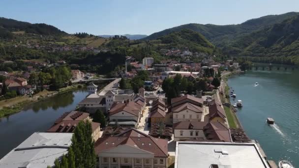 Visegrad Bosnia Herzegovina Drone Aerial View Andricgrad Buildings Drina River — Wideo stockowe