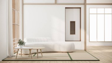 Minimalist japandi tarzı oturma odası kanepeyle süslenmiş..