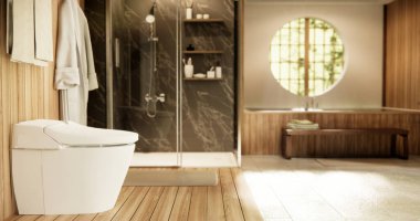 Japonya banyosunda ahşap ve siyah granit duvar. Modern Onsen tarzı.