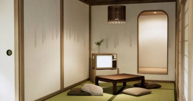 Kanbinet televizyonunda alçak masa, Japon tarzı lamba..